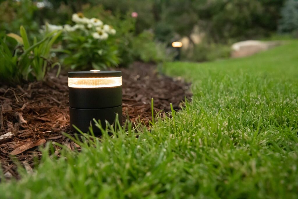outdoor light by green lawn